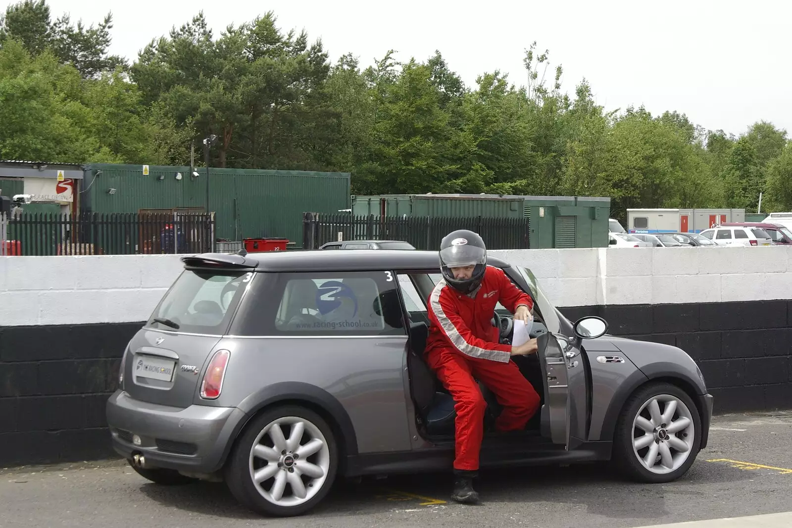 Exiting the Cooper S after the practice run, from Driving a Racing Car, Three Sisters Racetrack, Wigan, Lancashire - 24th June 2008