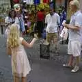 A passing girl is given a budgie for some reason, A Sojourn in The Eternal City, Rome, Italy - 22nd July 2008