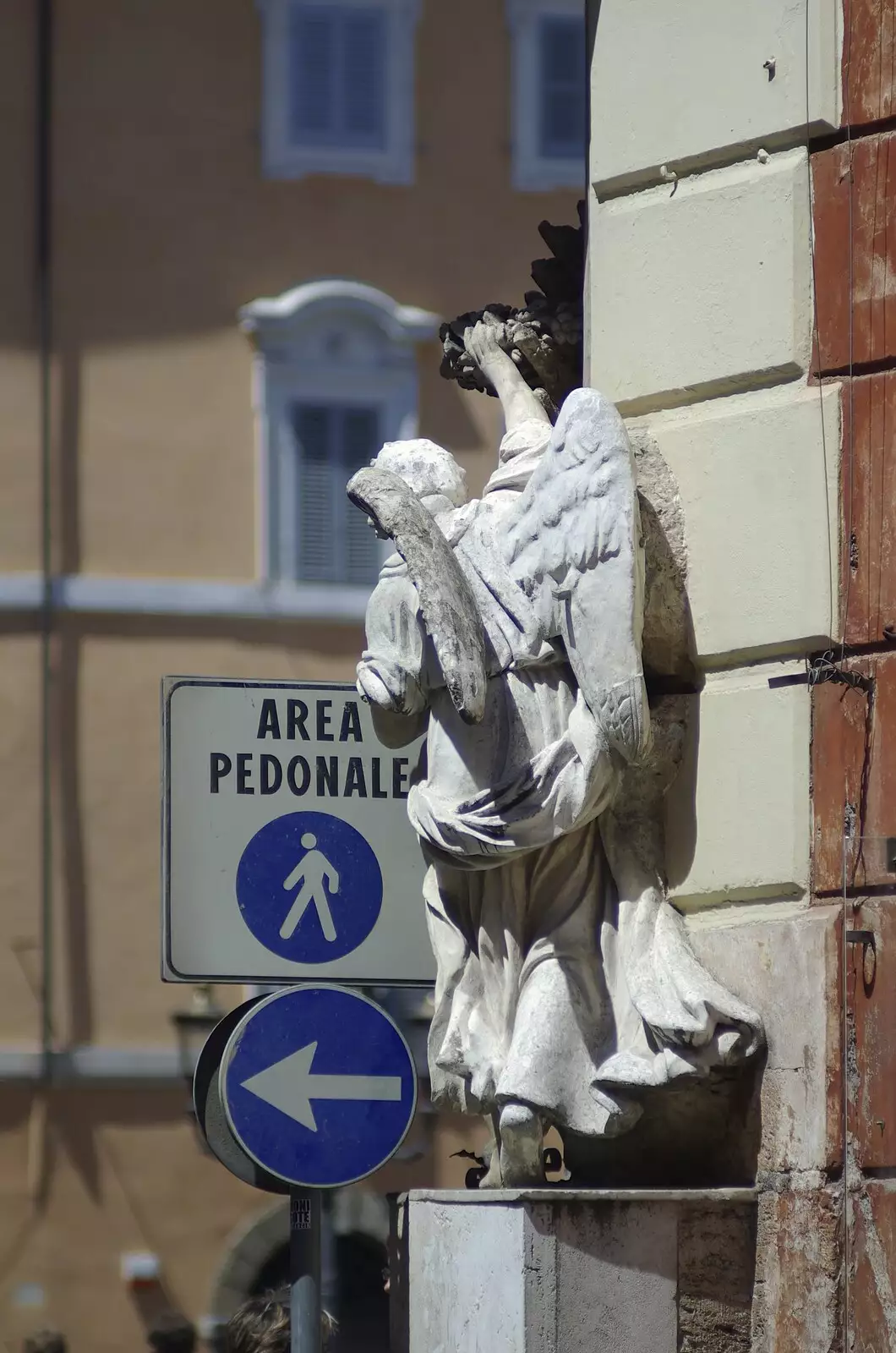 A statue peers round a street corner, from A Sojourn in The Eternal City, Rome, Italy - 22nd July 2008