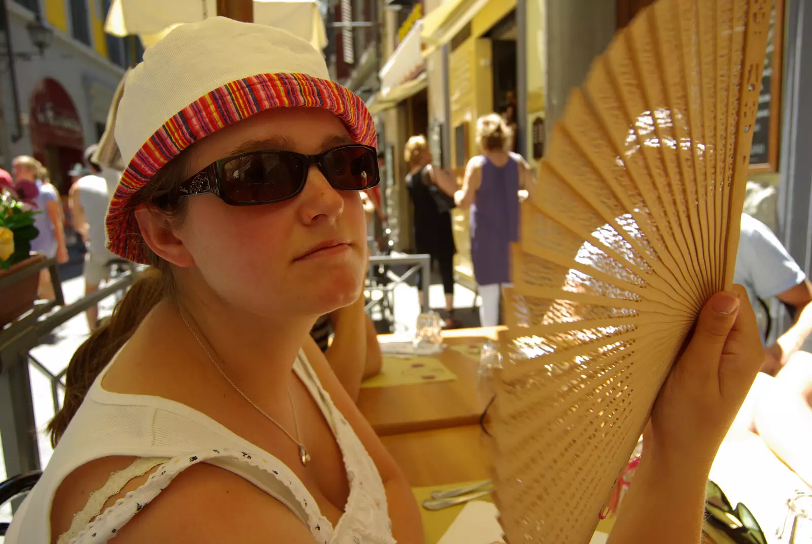 Isobel keeps cool with a fan, from A Day Trip to Firenze, Tuscany, Italy - 24th July 2008