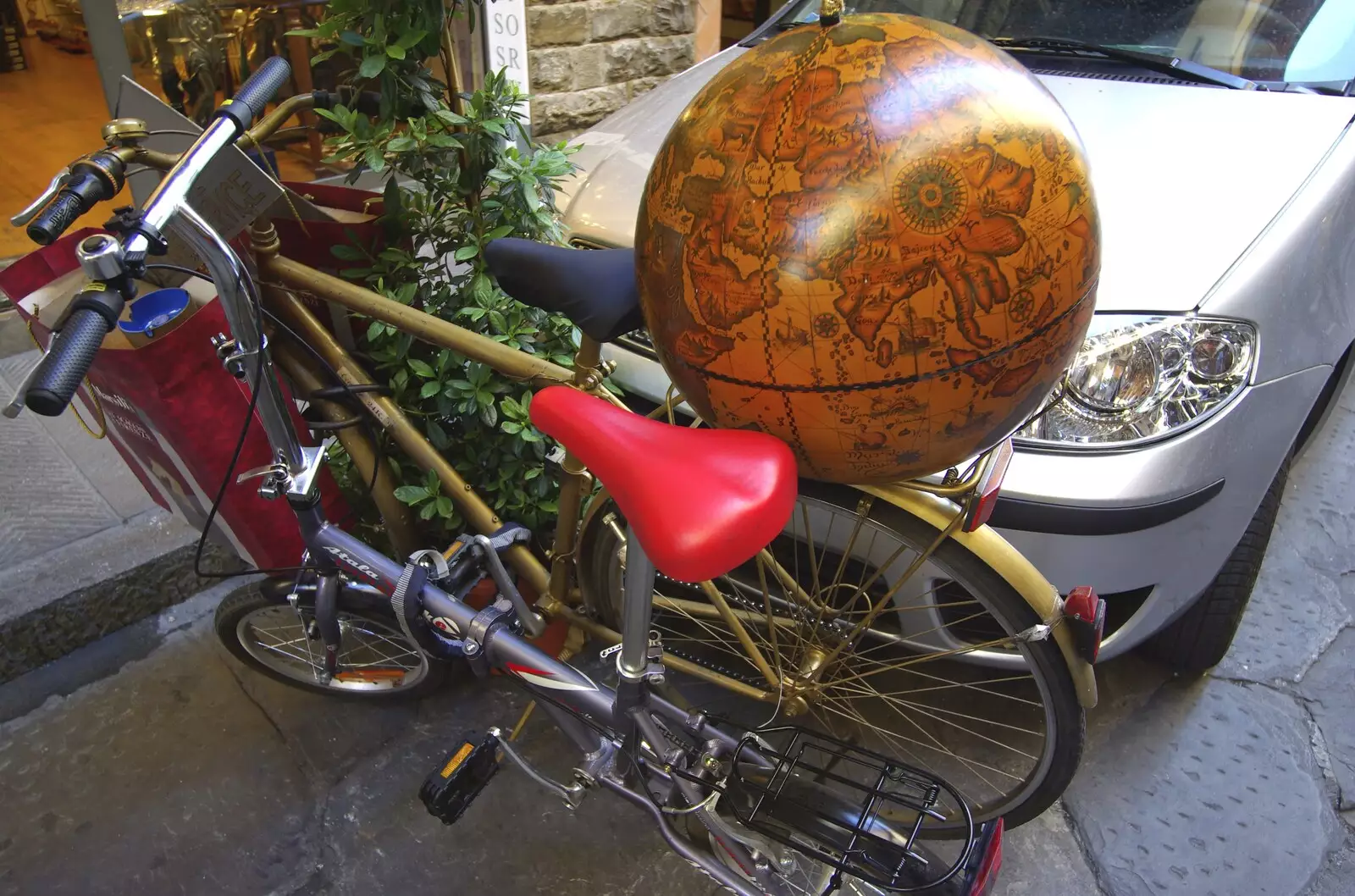 A globe on the back of a bike, from A Day Trip to Firenze, Tuscany, Italy - 24th July 2008