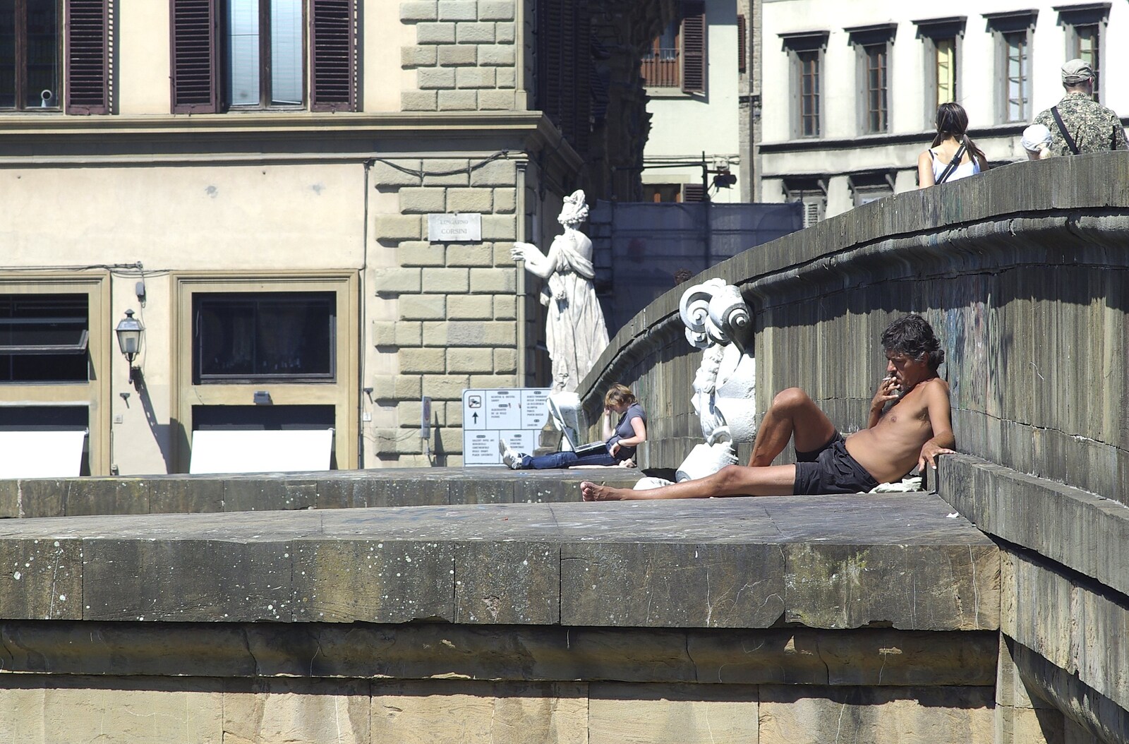 A dude chills out with a fag on a bridge from A Day Trip to Firenze, Tuscany, Italy - 24th July 2008