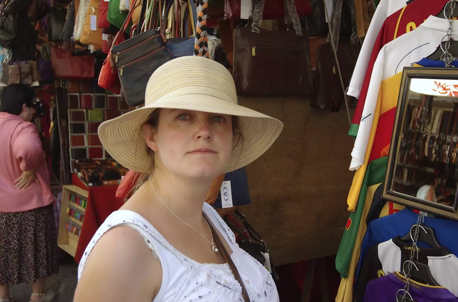 Isobel tries on a new hat, from A Day Trip to Firenze, Tuscany, Italy - 24th July 2008