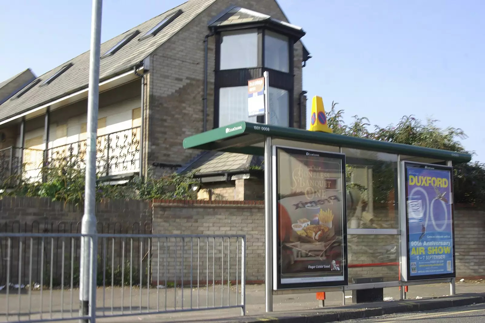 On Mill Road, there's a cone on the bus shelter, from A Brief Time in History: Stephen Hawking and the Corpus Christi Clock, Benet Street, Cambridge - 19th September 2008