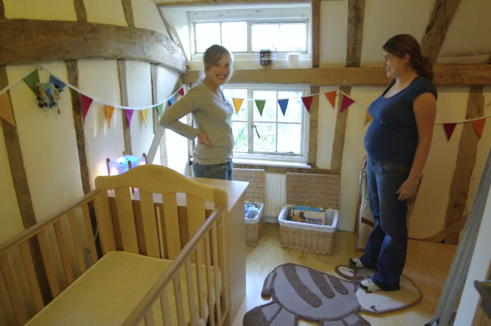 Jules and Isobel pause to inspect the result, from Taptu's First Birthday and Nursery Decorating, Cambridge and Suffolk- 19th October 2008