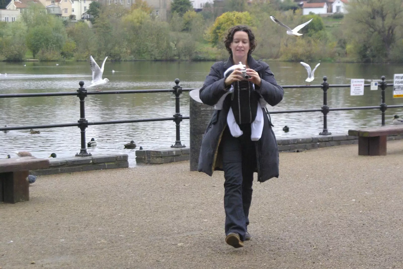 Evelyn strides around, and checks her photos, from Isobel's Birthday and a Café Miscellany, Cambridge and Suffolk - 2nd November 2008