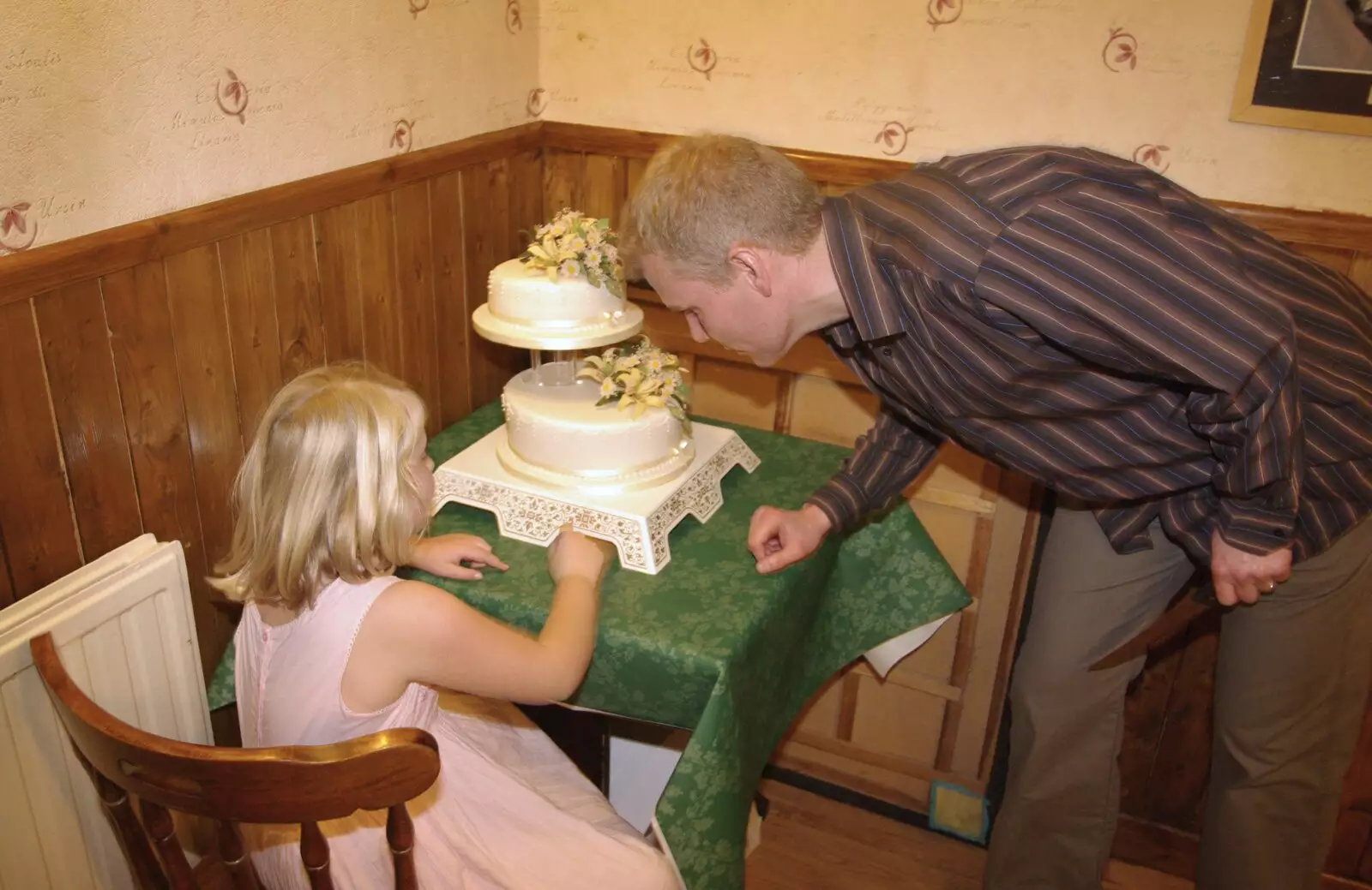 Bill checks out the cake, from Bill and Carmen's Post-Wedding Thrash, Yaxley Cherry Tree, Suffolk - 8th November 2008