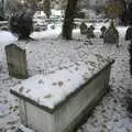 Orange leaves scatter on a snowy grave, Snow Days, Brome, Suffolk - 22nd November 2008