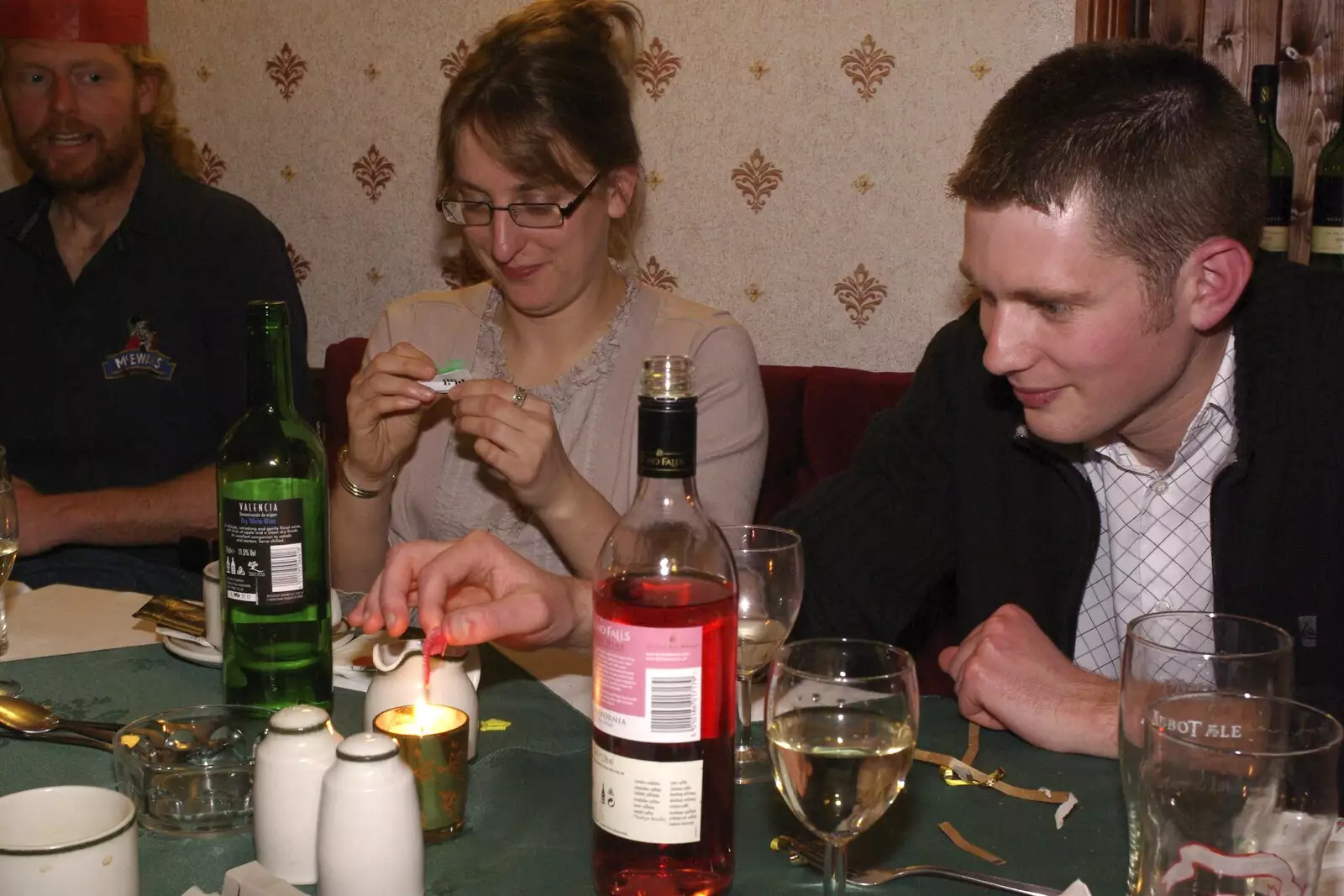 Phil sets fire to his cracker toy, from The BSCC Christmas Dinner, The Swan Inn, Brome, Suffolk - 6th December 2008