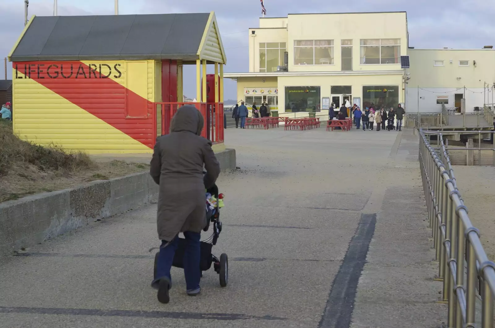 Isobel and Fred stroll along the promenade, from To The Coast By Satnav, Southwold, Suffolk - 28th December 2008