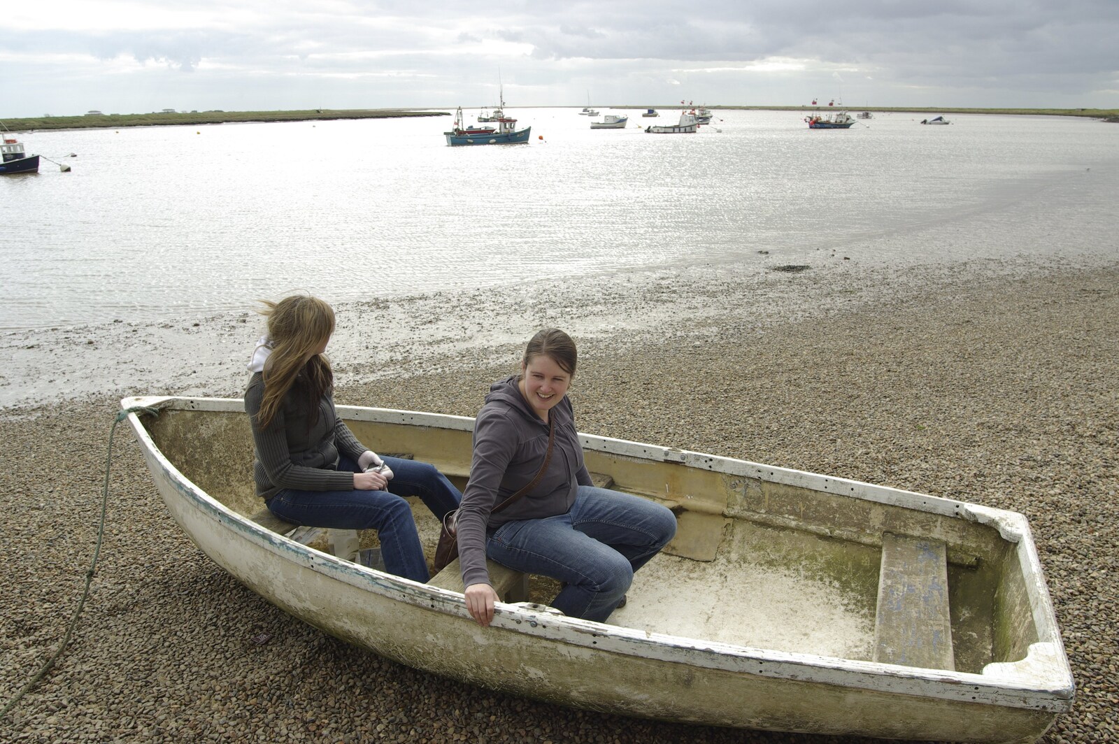 Jen and Isobel get giggly in an old boat from A Trip to Orford Castle, Suffolk - 14th March 2009
