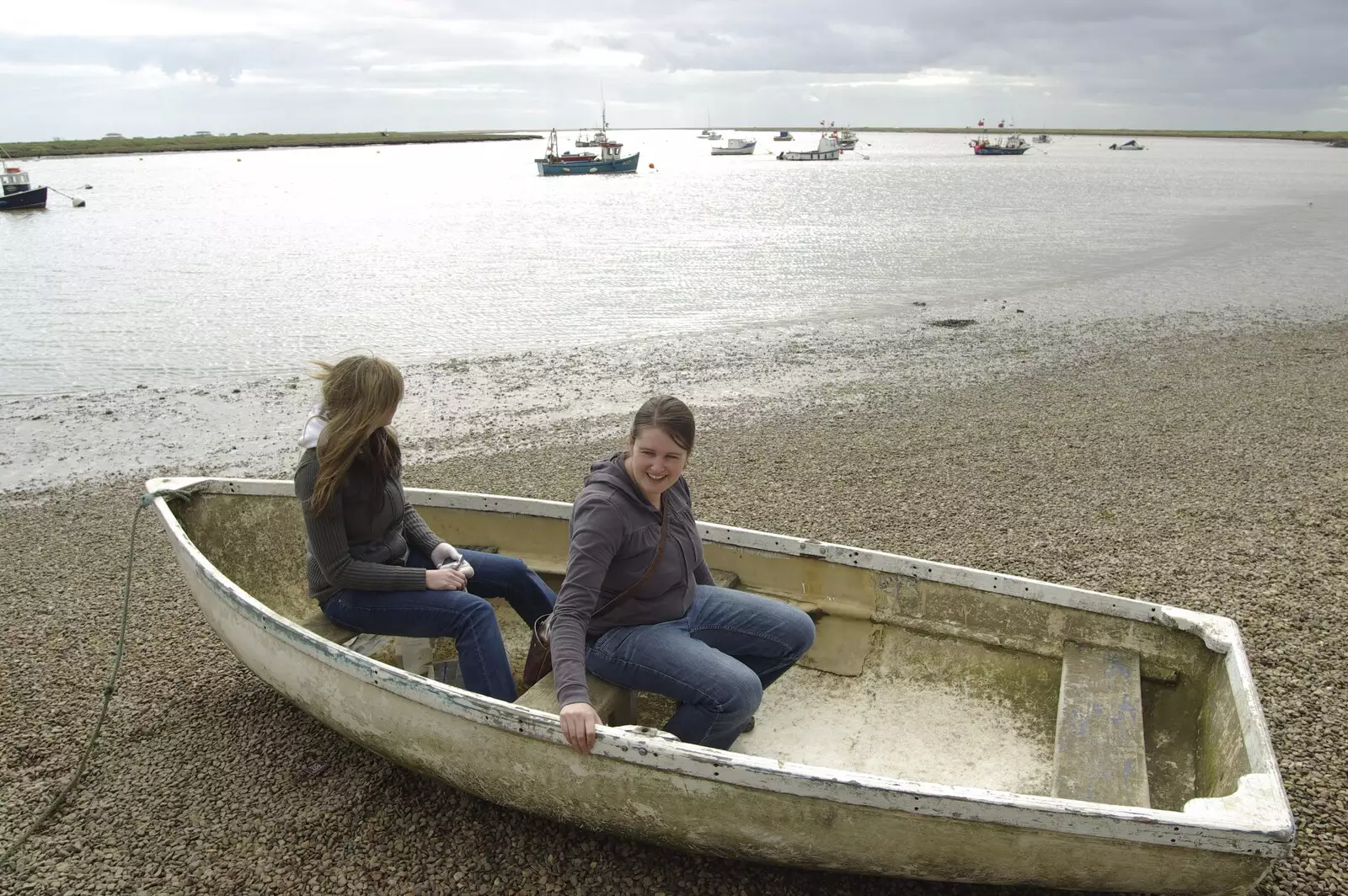 Jen and Isobel get giggly in an old boat, from A Trip to Orford Castle, Suffolk - 14th March 2009