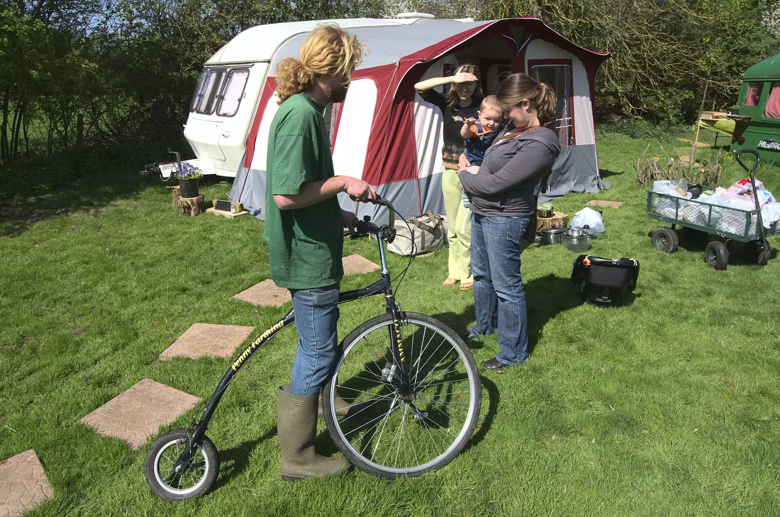 Fred watches as Wavy gets a Penny Farthing out, from Lunch With Wavy and Martina, Brome, Suffolk - 18th April 2009