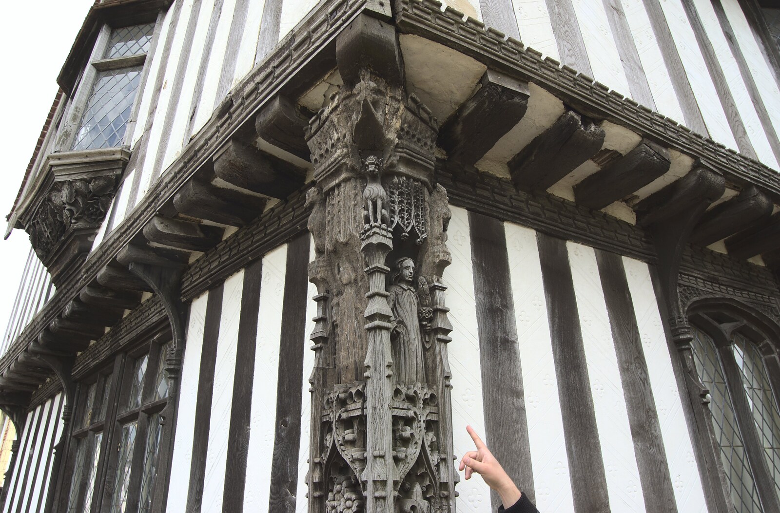 Rachel points to some impressive carvings from A Visit from Rachel and Sam, Brome, Suffolk - 26th April 2009