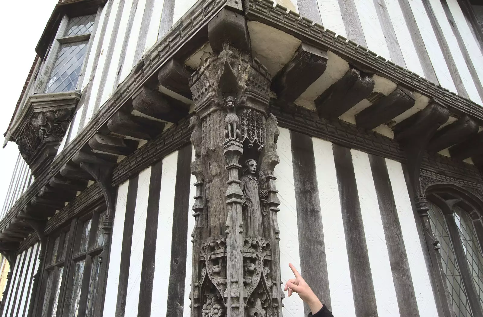 Rachel points to some impressive carvings, from A Visit from Rachel and Sam, Brome, Suffolk - 26th April 2009