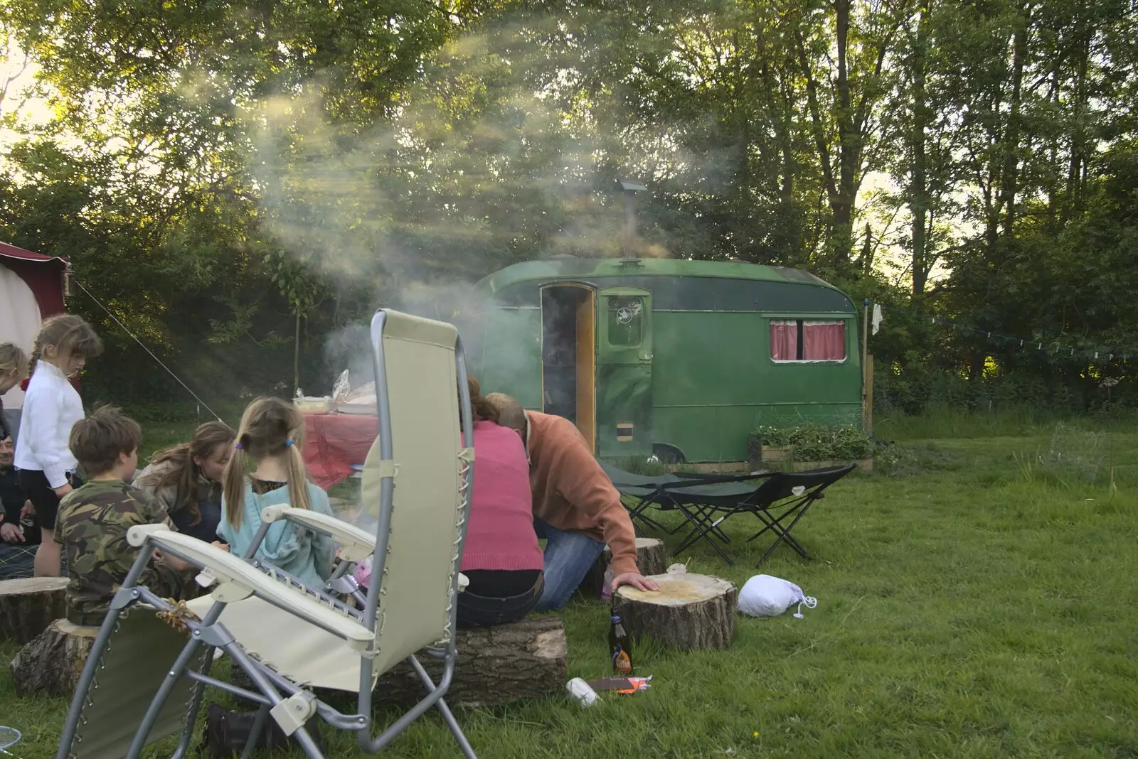 Smoke lingers over the old caravan, from Martina's Birthday Barbeque, Thrandeston, Suffolk - 23rd May 2009