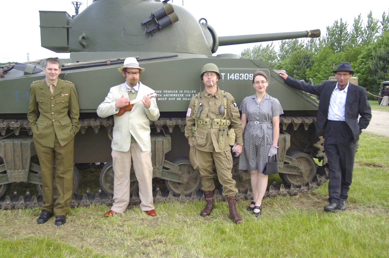 The gang in front of a tank from The Debach Airfield 1940s Dance, Debach, Suffolk - 6th June 2009
