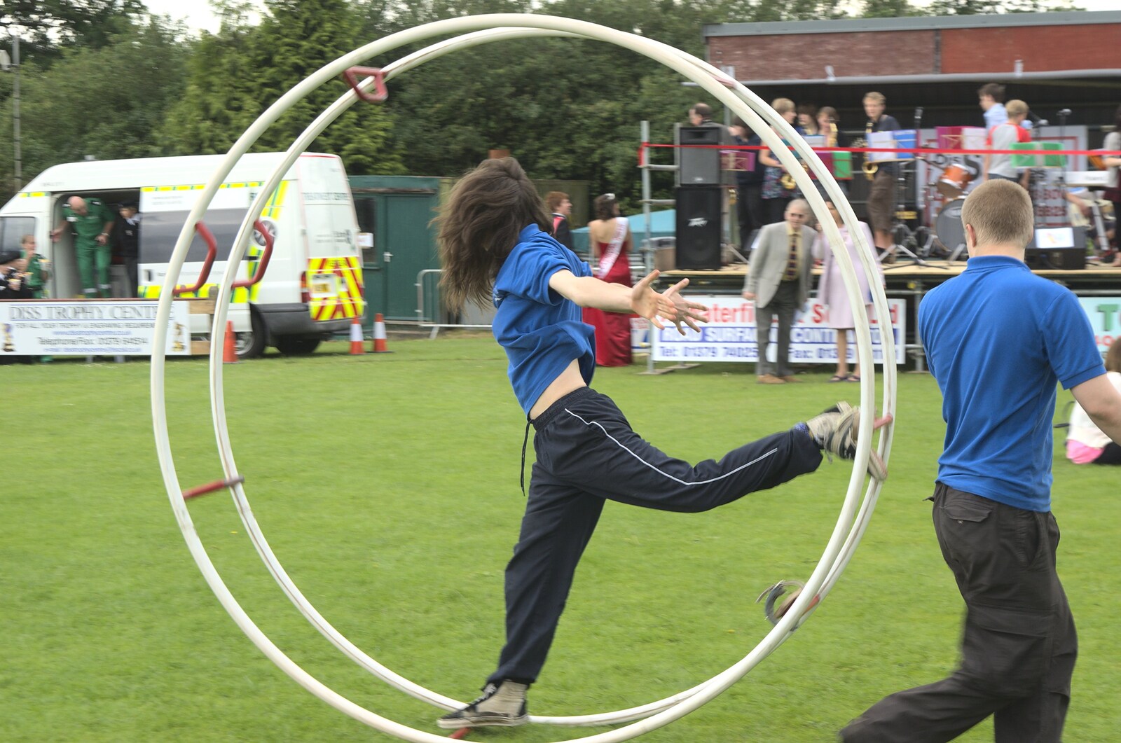 People roll around in steel hoops from Diss Carnival Procession, Diss, Norfolk - 21st June 2009
