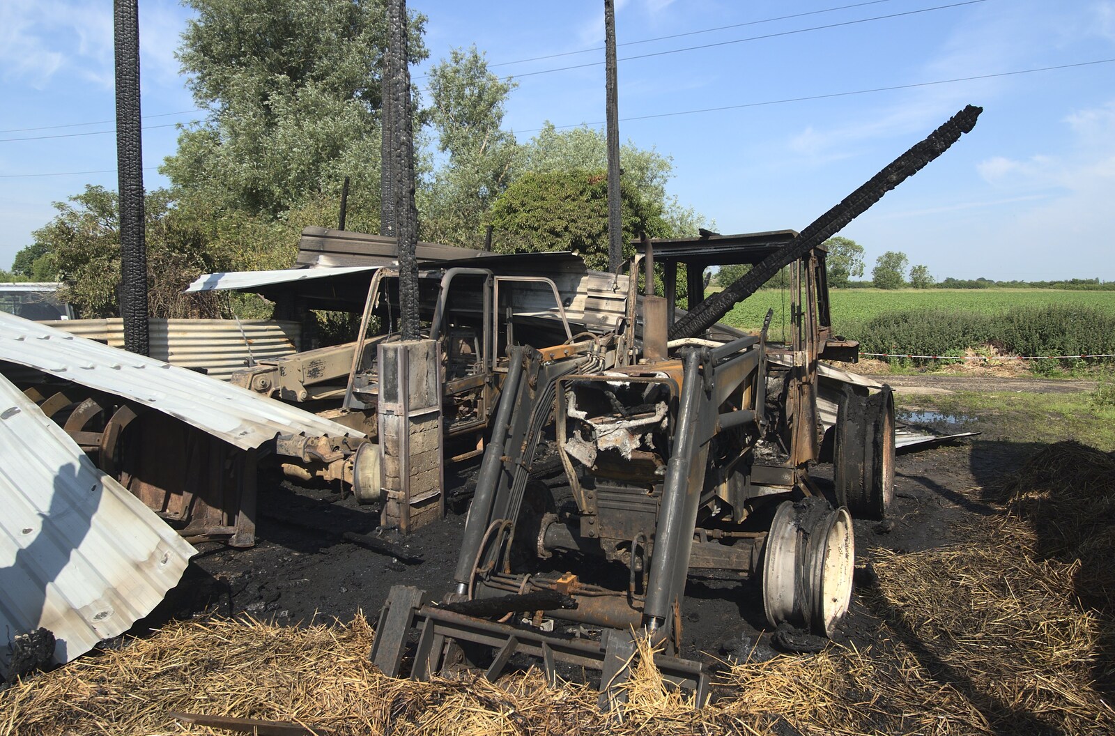 A destroyed tractor from A Fire at Valley Farm, Thrandeston, Suffolk - 24th June 2009