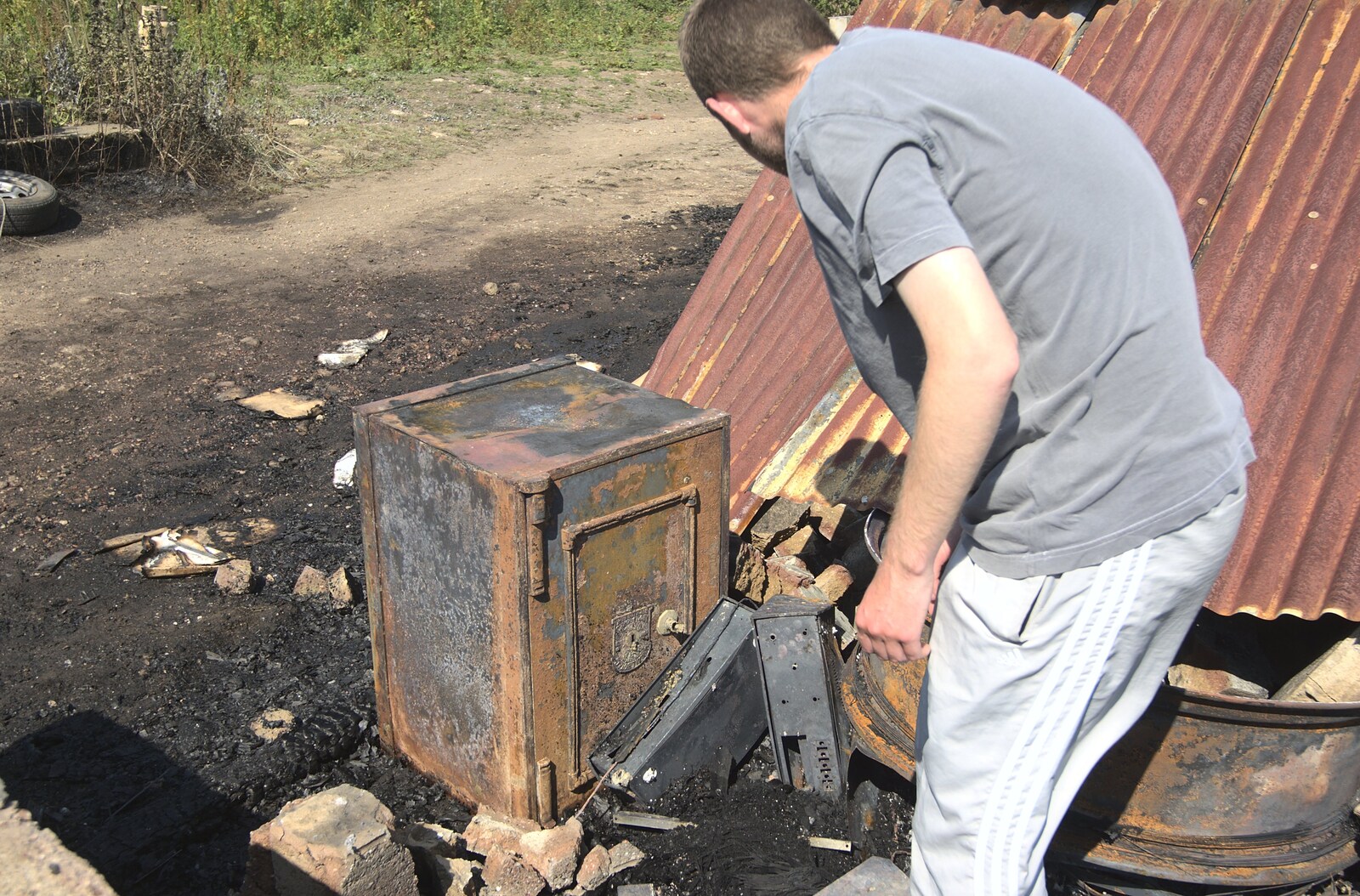 The Boy Phil inspects his prized safe - now wrecked from A Fire at Valley Farm, Thrandeston, Suffolk - 24th June 2009