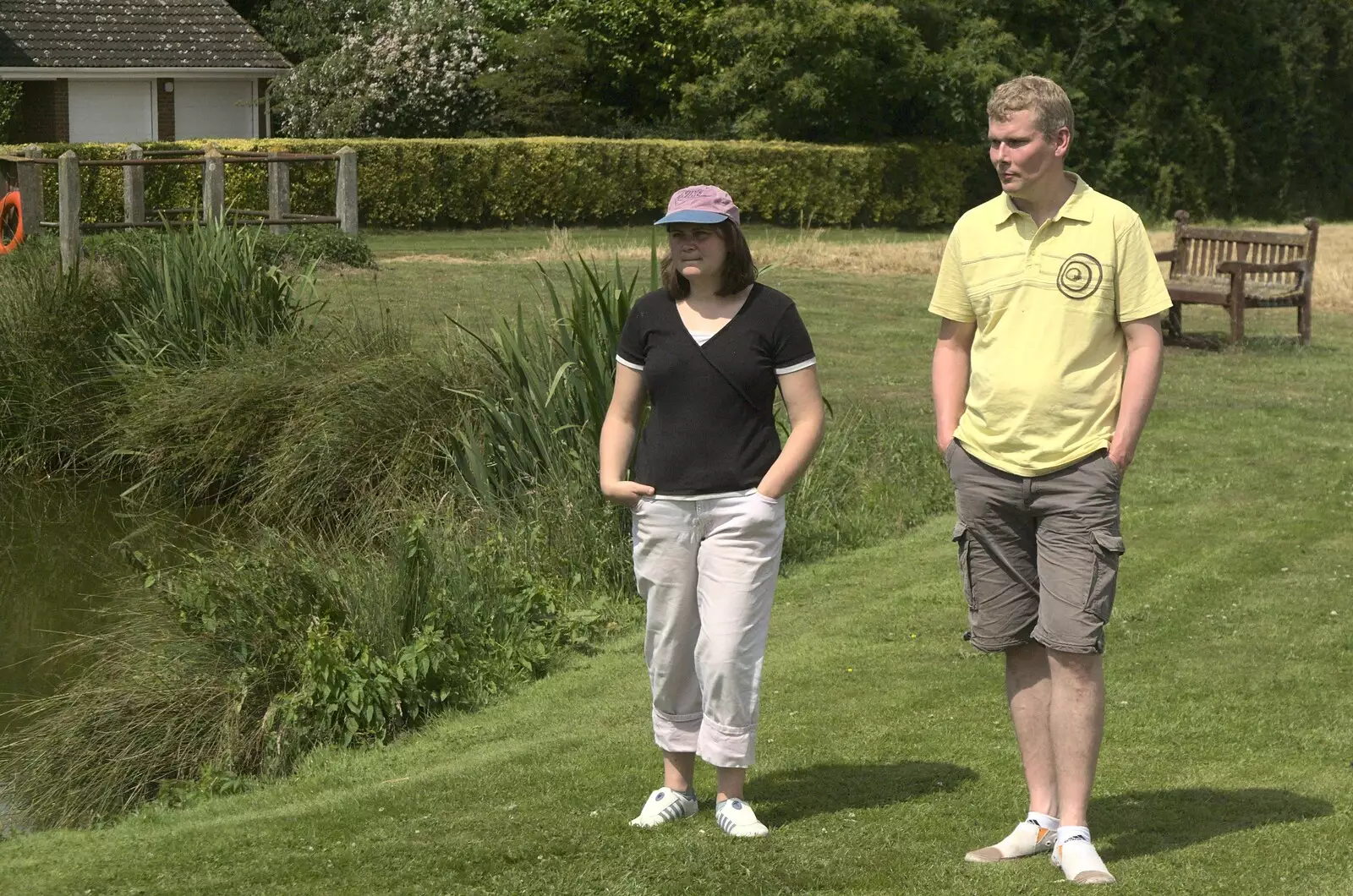 Claire and Bill walk around the pond, from Thrandeston Pig: A Hog Roast, Little Green, Thrandeston, Suffolk - 29th June 2009