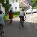 Cycling back through Brome Street, The Brome Village Fête, Brome, Suffolk - 4th July 2009