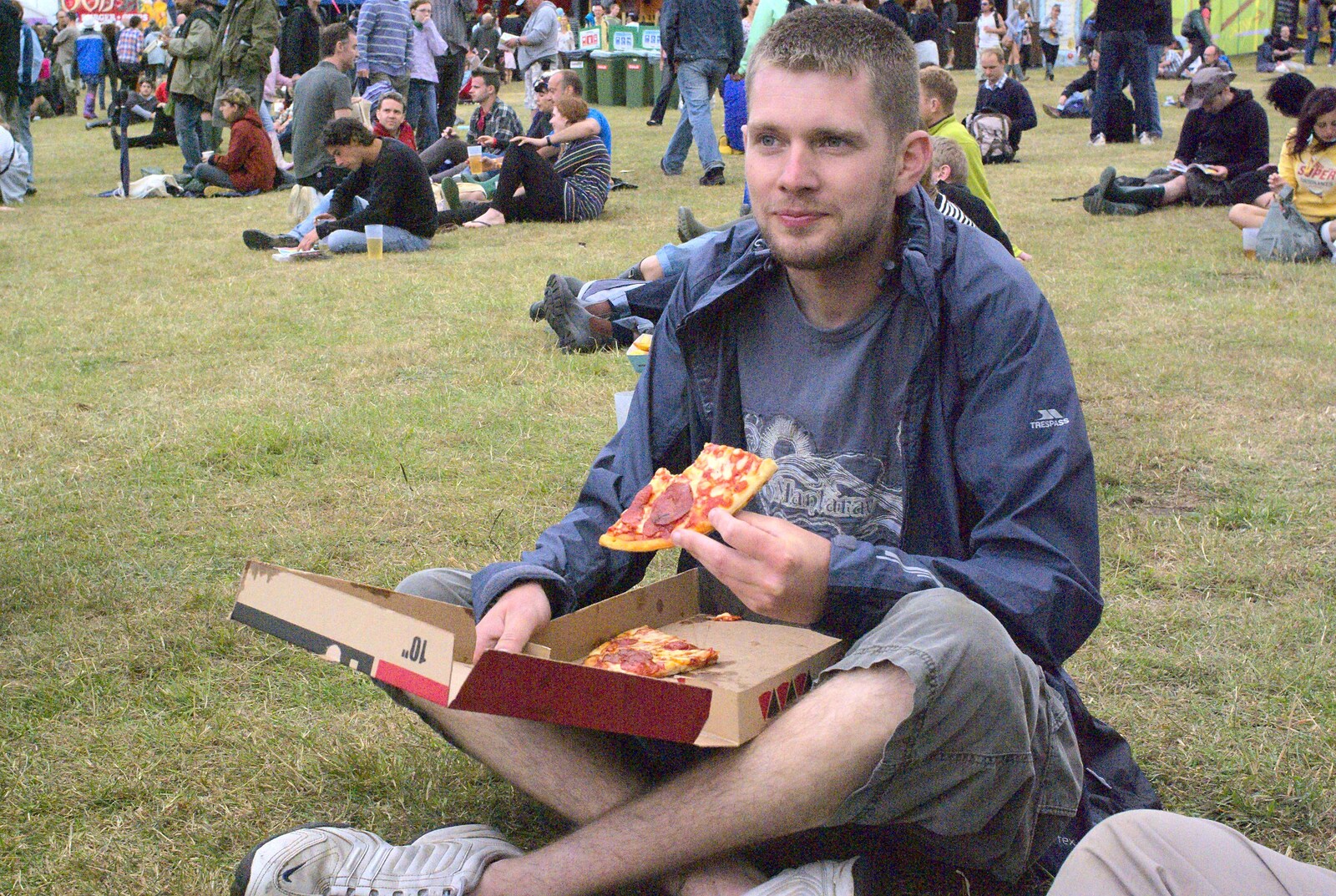 The Boy Phil eats pizza from The Latitude Festival, Henham Park, Suffolk - 20th July 2009