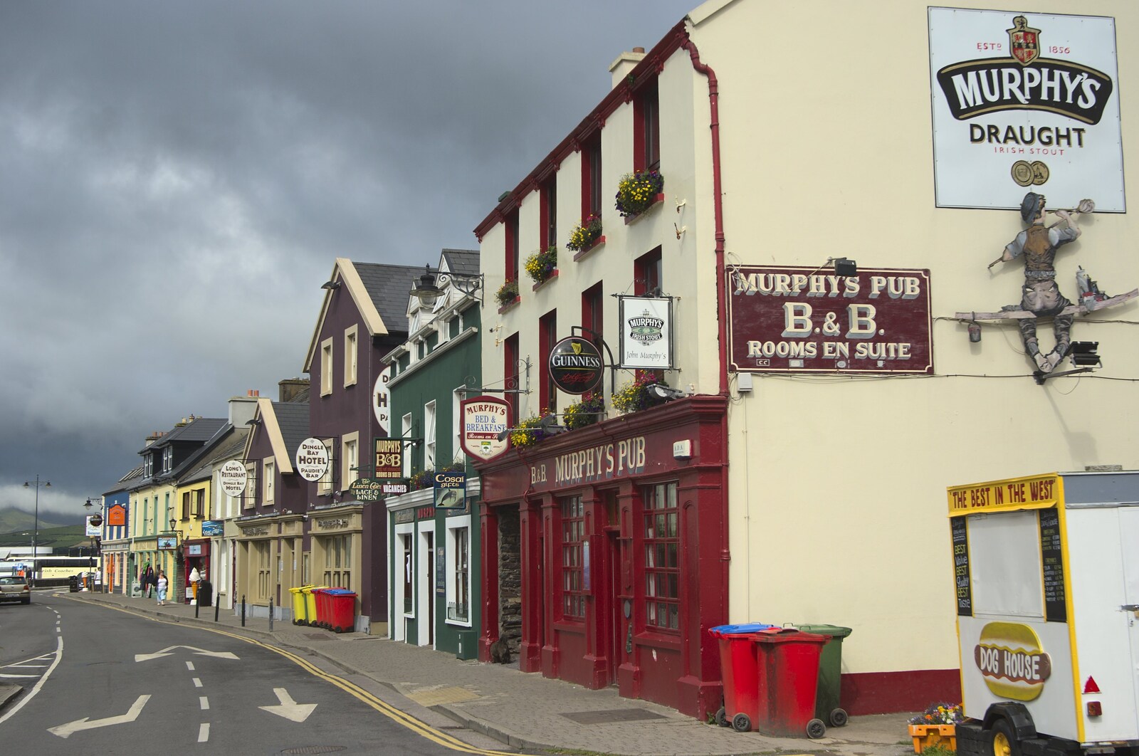 Brightly-painted buildings stand up to the ominous clouds from A Trip to Dingle, County Kerry, Ireland - 21st July 2009