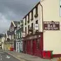 Brightly-painted buildings stand up to the ominous clouds, A Trip to Dingle, County Kerry, Ireland - 21st July 2009