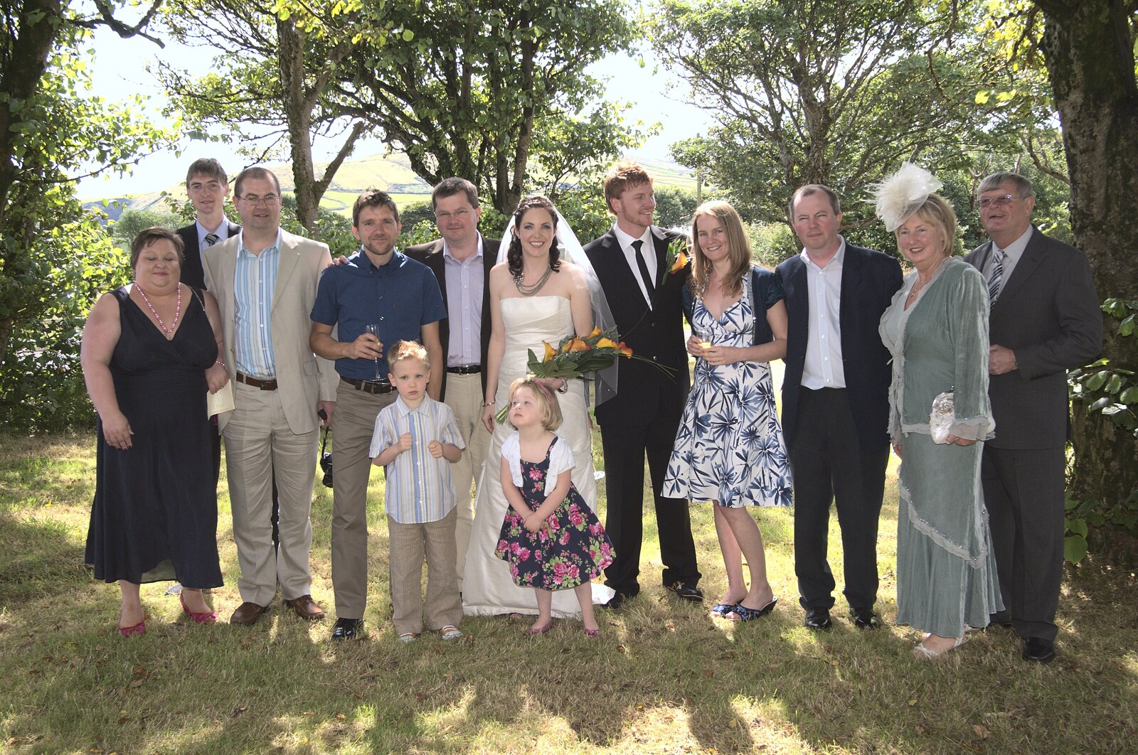 A group wedding photo from Julie and Cameron's Wedding, Ballintaggart House, Dingle - 24th July 2009