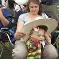 Fred tries on Adrian's hat. It's a little on the large side, The Cambridge Folk Festival, Cherry Hinton Hall, Cambridge - 1st August 2009