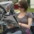 Emma reads a magazine, The Cambridge Folk Festival, Cherry Hinton Hall, Cambridge - 1st August 2009