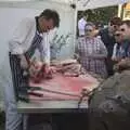 A butchery demonstration is occuring, Harvest Festival at Jimmy's Farm, Wherstead, Suffolk - 12th September 2009