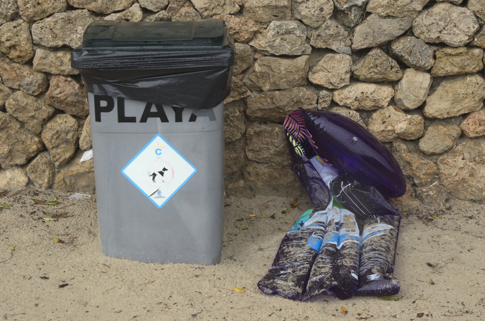 Beach bin and a discarded lilo from A Postcard From Palmanova, Mallorca, Spain - 21st September 2009