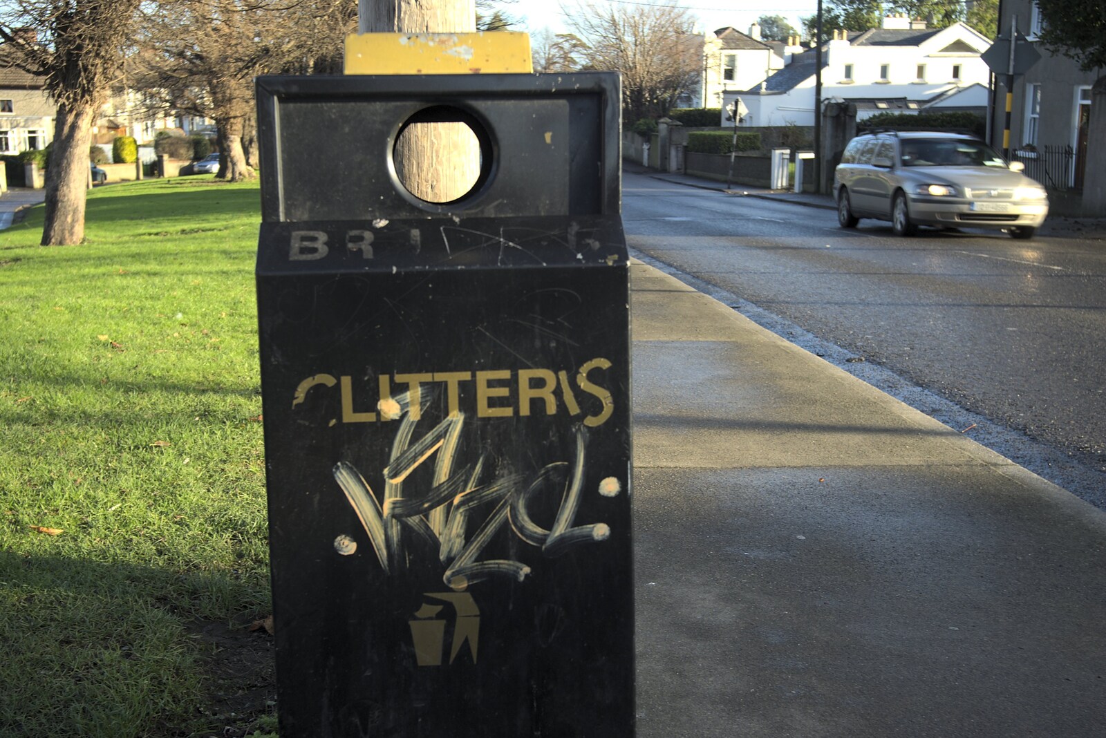 A litter bin's wording has been amusingly modified from Monkstown Graffiti and Dereliction, County Dublin, Ireland - 26th December 2009