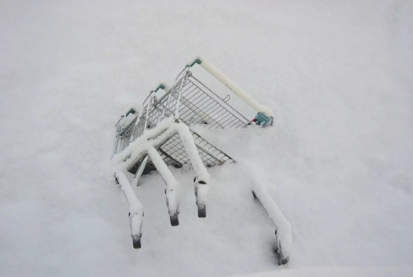 Some more trolleys' legs stick out of the frozen Mere, from A Snowy Miscellany, Diss, Norfolk - 9th January 2010