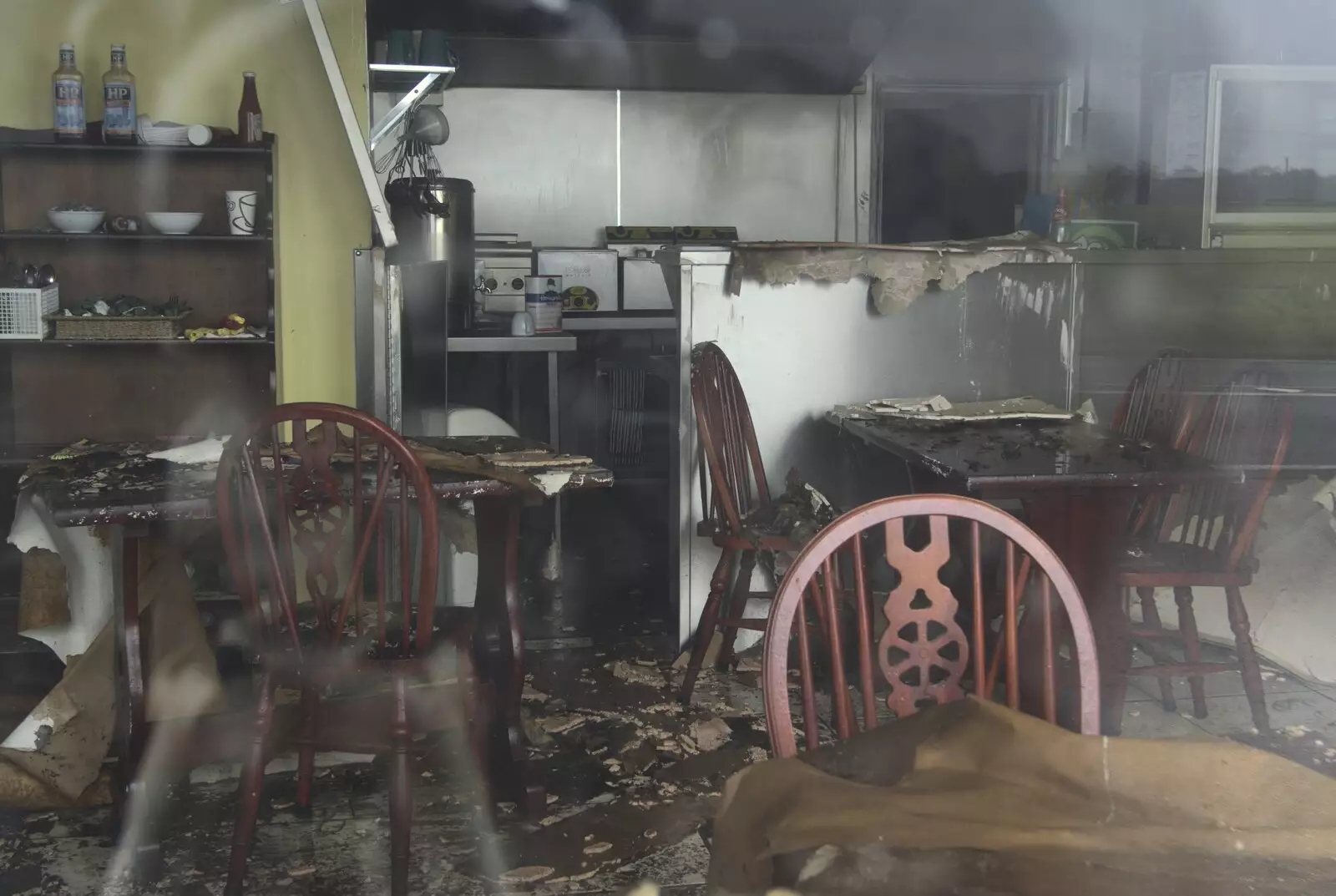 A café seems to have caught fire and been abandoned, from A Derelict Petrol Station, Brockford Street, Suffolk - 7th February 2010