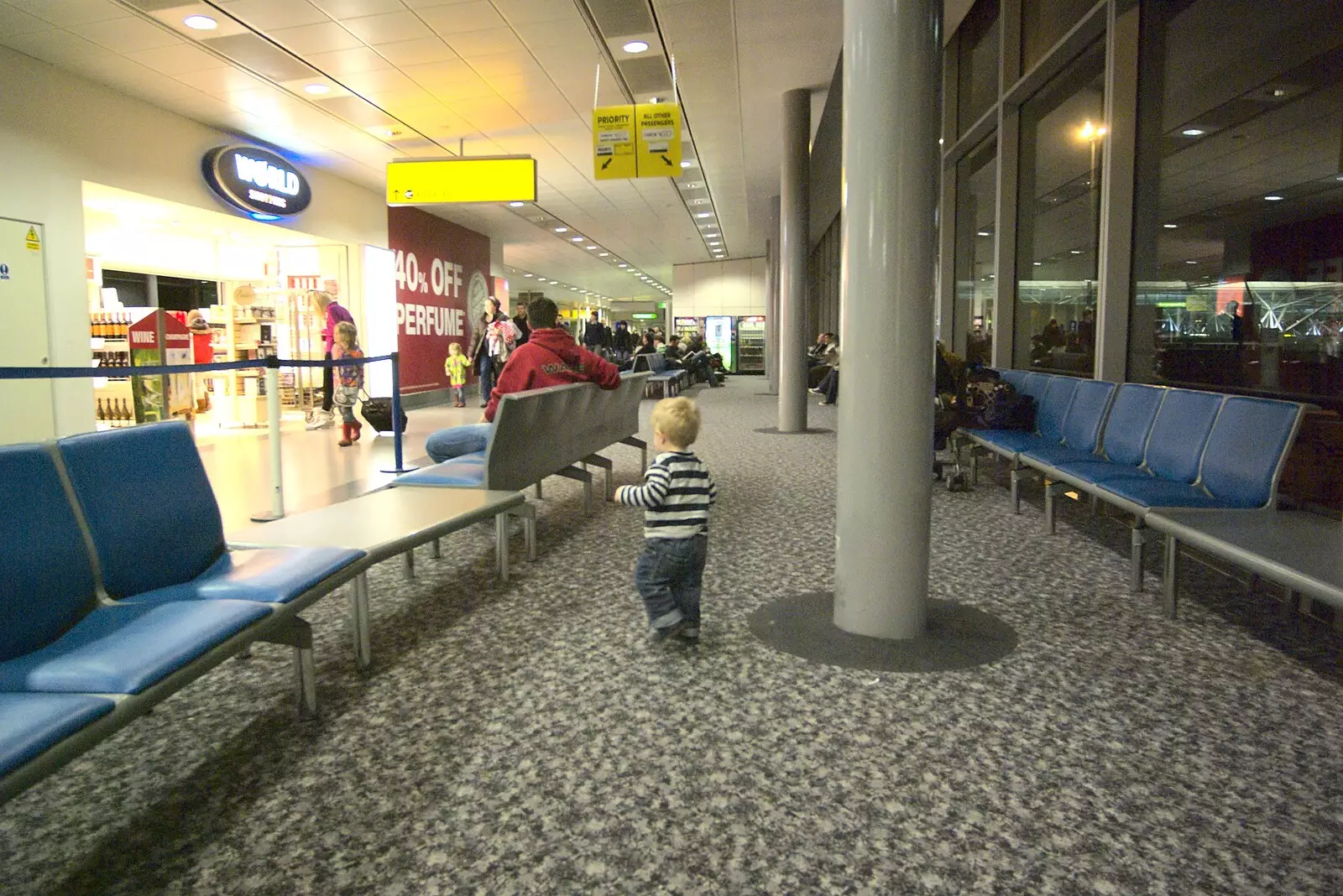 Fred roams around near Gate 40 at Stansted, from A Day in Greystones, County Dublin, Ireland - 28th February 2010