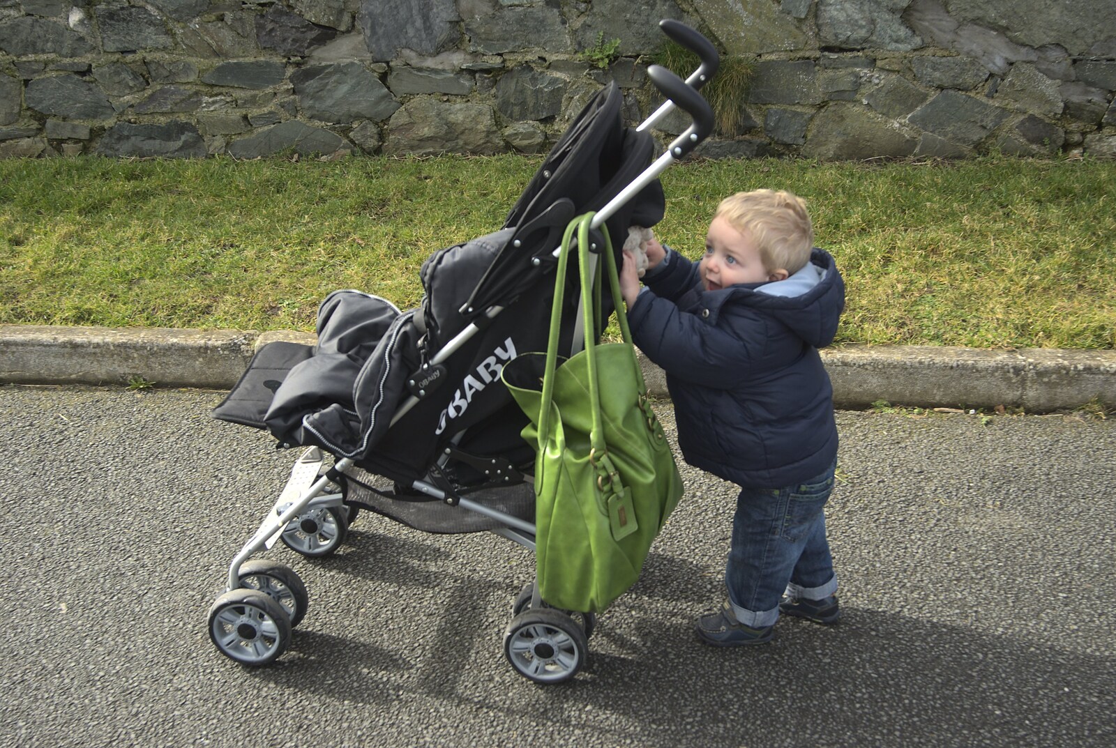 Fred pushes his own buggy along from A Day in Greystones, County Dublin, Ireland - 28th February 2010