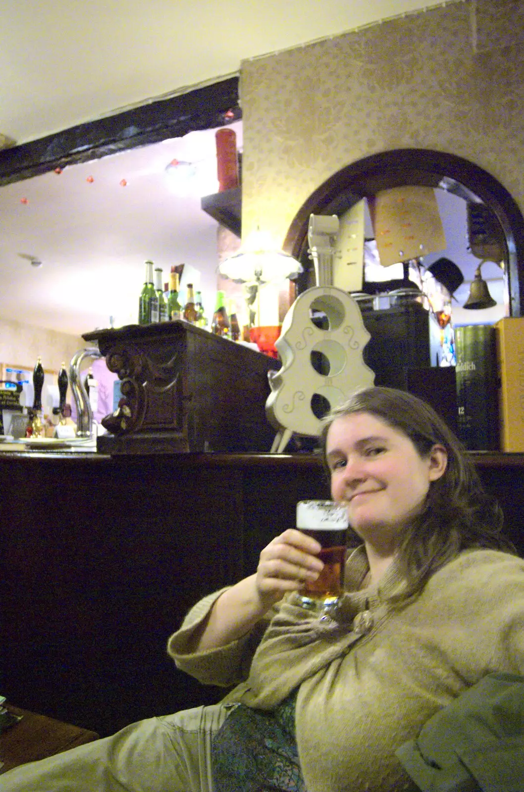 Isobel has a beer, from Easter in Chagford and Hoo Meavy, Devon - 3rd April 2010