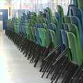 2010 At Hartismere High School in Eye, a stack of exam chairs lurk in the corridor