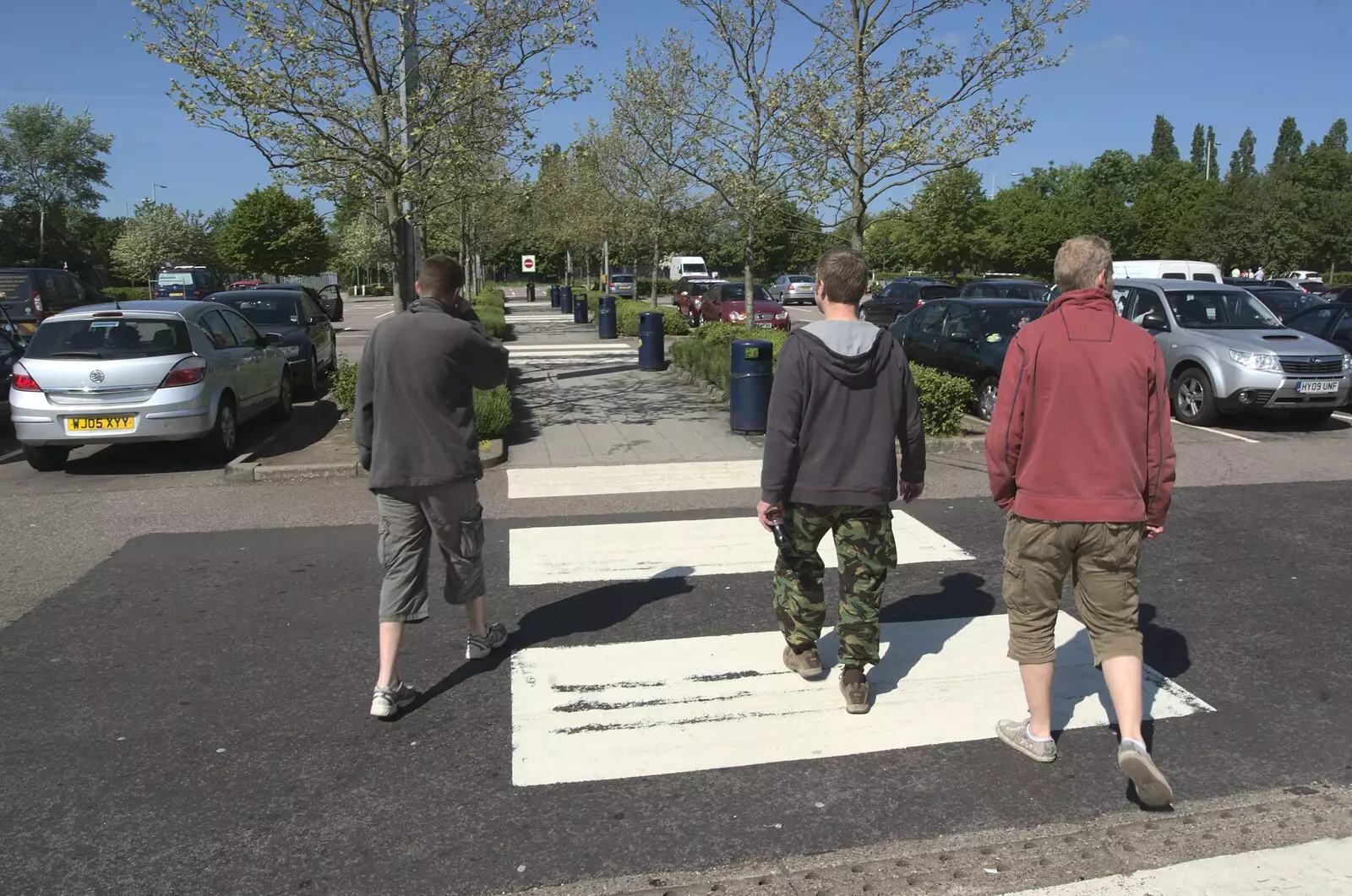 The lads do 'Abbey Road' thing at South Mimms, from Nosher's Stag Weekend: Paintball at Emery Down, and Lymington, Hampshire - 22nd May 2010