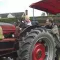 Nosher watches Fred on a tractor, Fred at the Carnival, Brewer's Green Lane, Diss, Norfolk - 21st June 2010