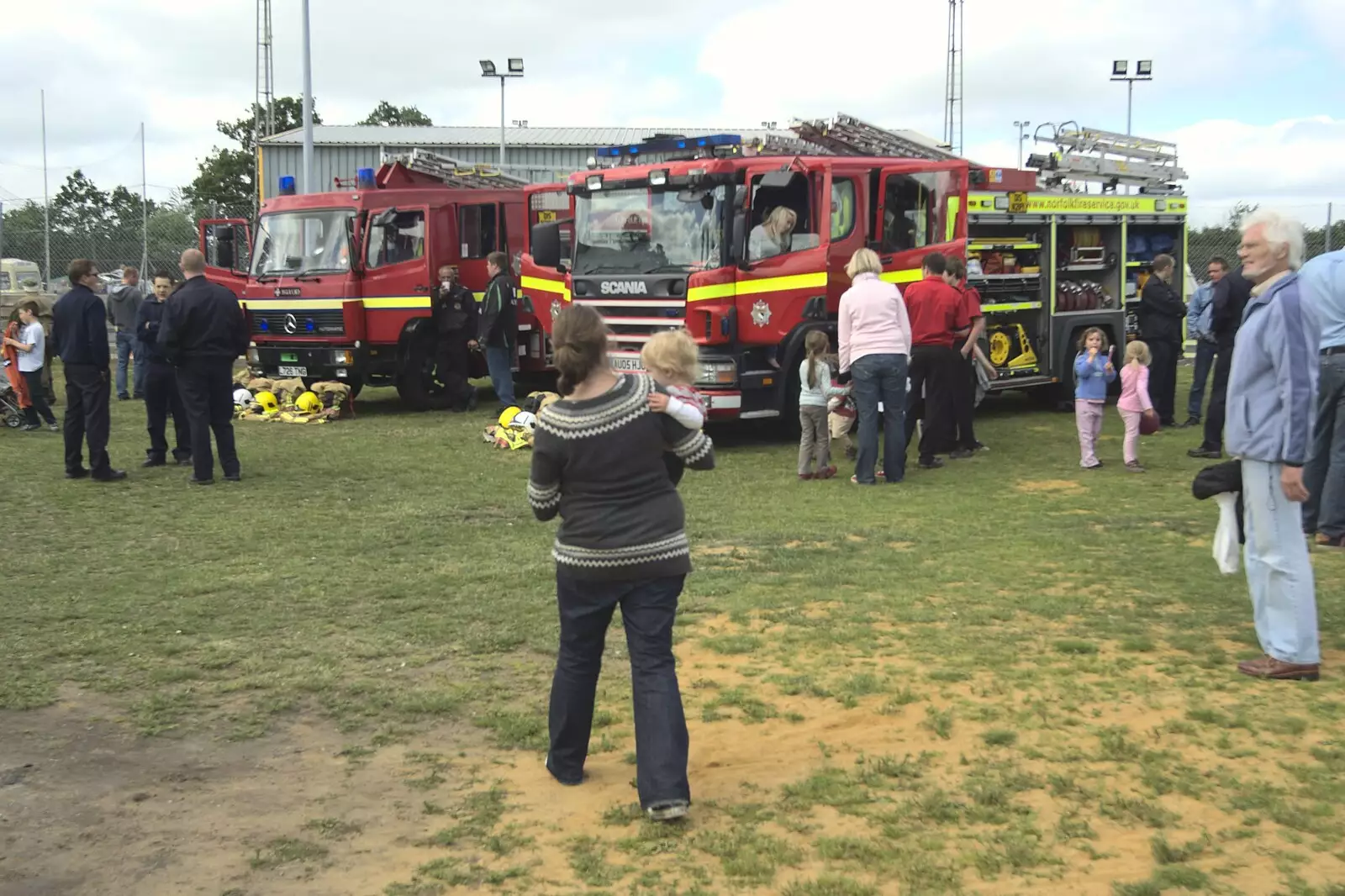 Isobel takes Fred to see fire engines, from Fred at the Carnival, Brewer's Green Lane, Diss, Norfolk - 21st June 2010