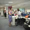 2010 In the office, Mareike hands over a leaving gift