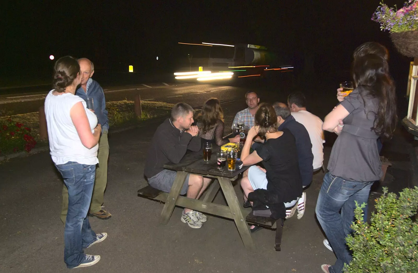 The gang outside on the bench, from Wedding-Eve Beers at The Swan Inn, Brome, Suffolk - 2nd July 2010