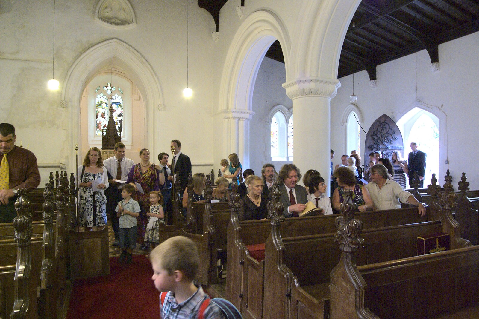 The crowds filter in from Nosher and Isobel's Wedding, Brome, Suffolk - 3rd July 2010