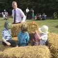 Bill helps build a straw-bale fort, Nosher and Isobel's Wedding, Brome, Suffolk - 3rd July 2010