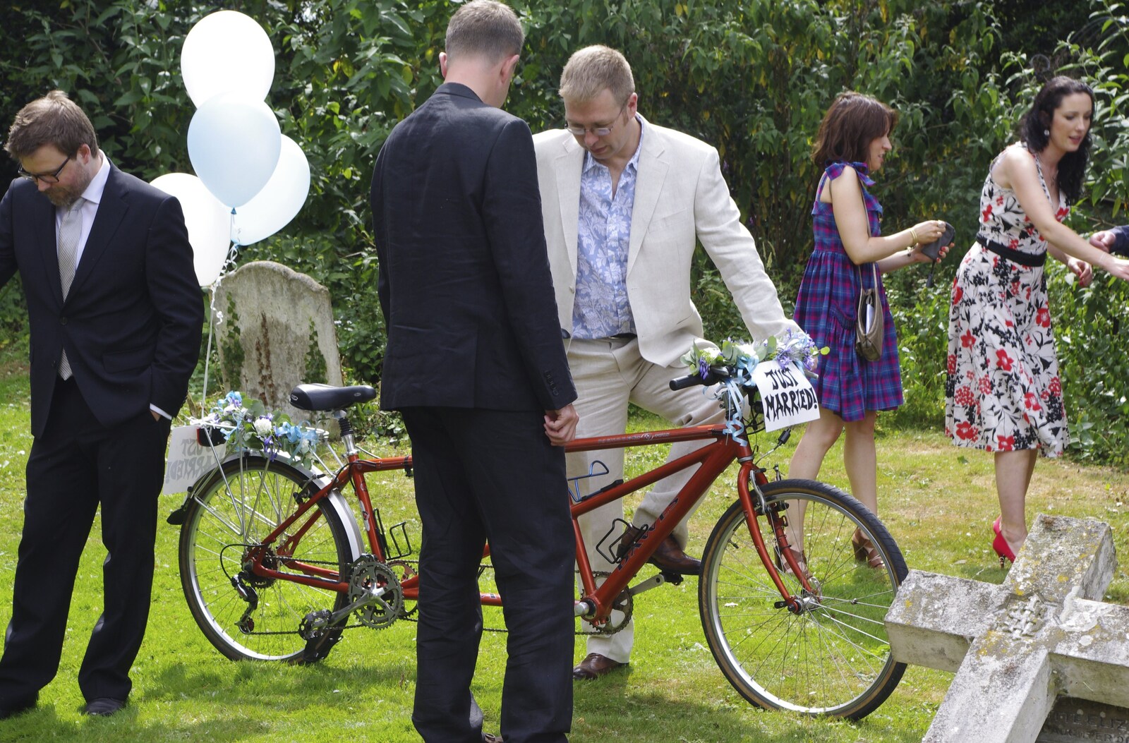 Marc checks over the tandem from Nosher and Isobel's Wedding, Brome, Suffolk - 3rd July 2010