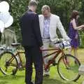 Marc checks over the tandem, Nosher and Isobel's Wedding, Brome, Suffolk - 3rd July 2010